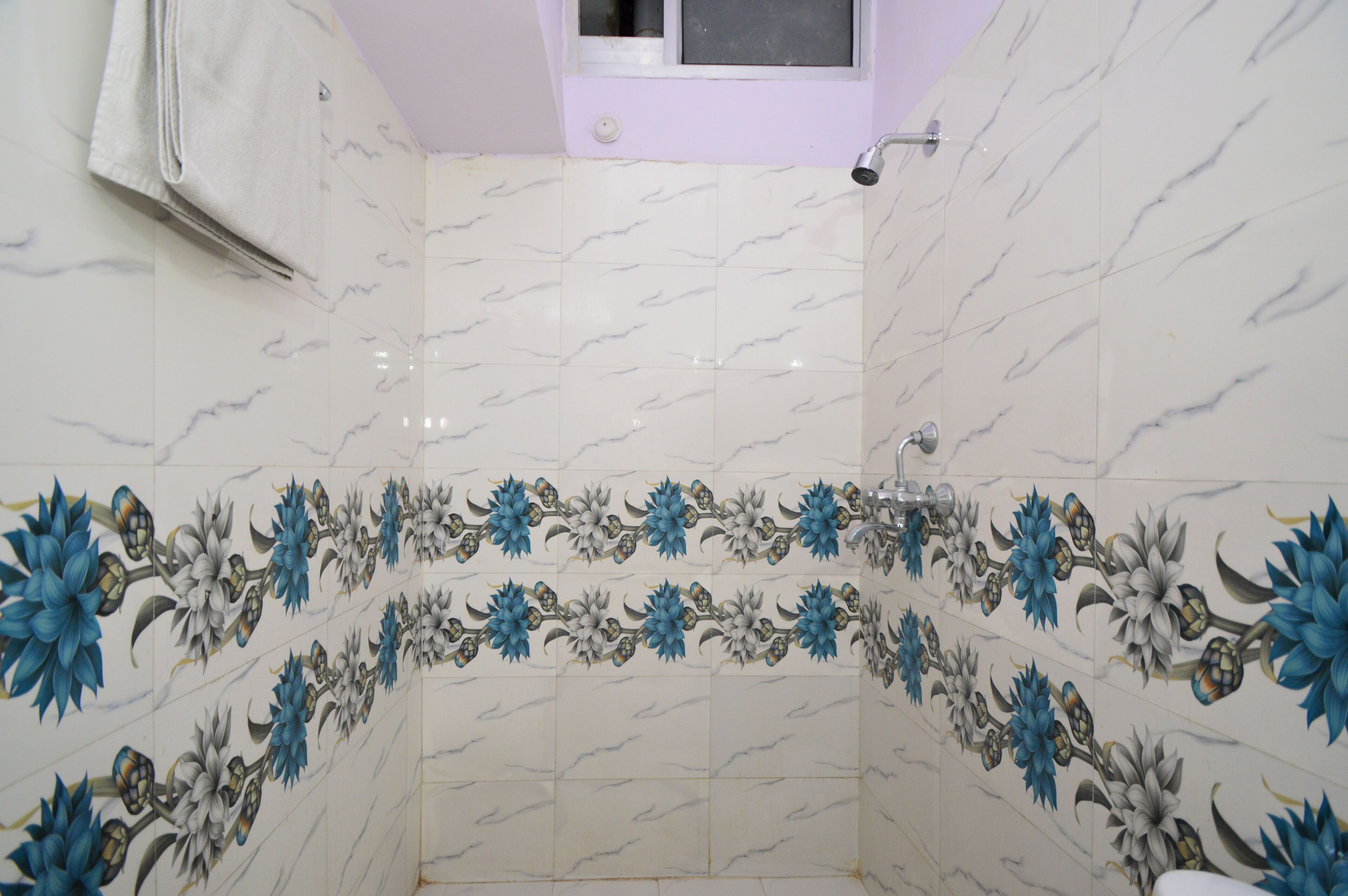 Family Room, Multiple Beds (With AC) | Bathroom | Shower, free toiletries, slippers, towels