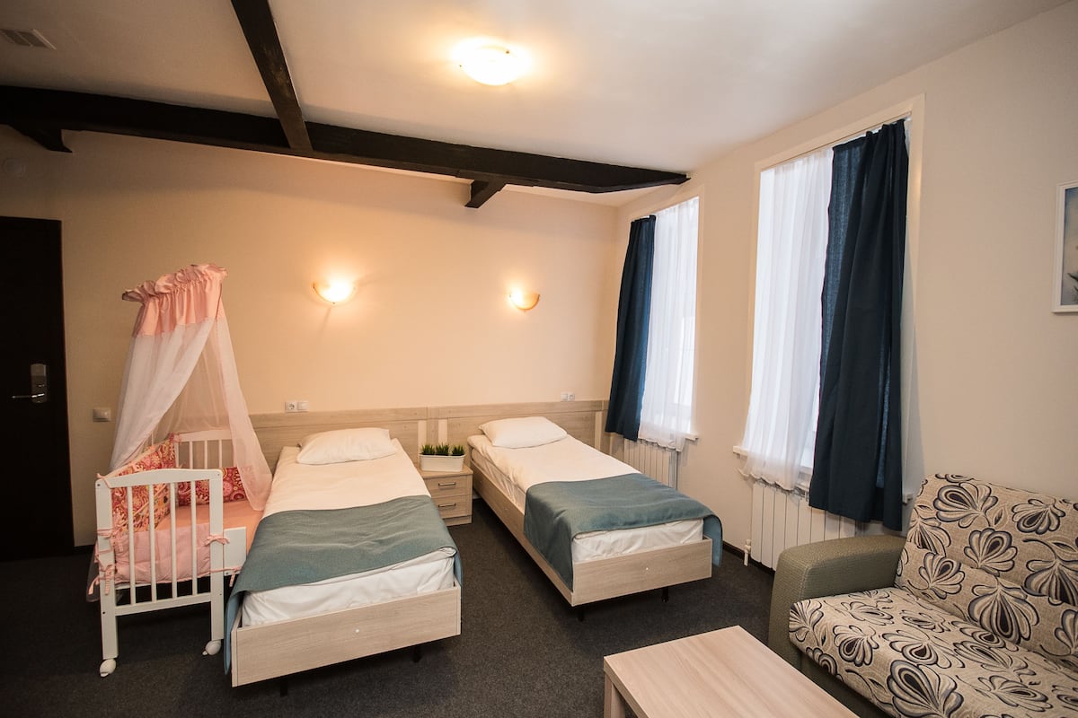 Family Triple Room | Desk, free WiFi, bed sheets