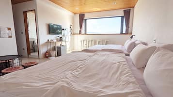 Basic Quadruple Room, 2 Queen Beds, Mountain View, Tower | Blackout curtains, free WiFi, bed sheets