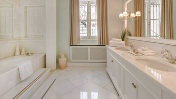 Executive Suite, 1 Bedroom | Bathroom | Free toiletries, hair dryer, bathrobes, slippers