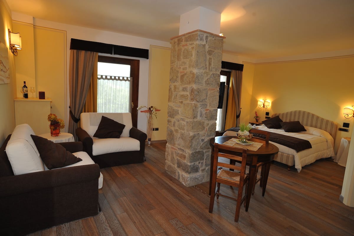 minibar, desk, blackout curtains, iron/ironing board