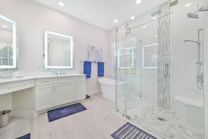 Bathtub, hair dryer, towels