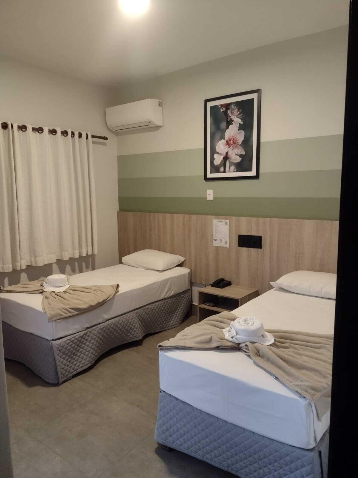 deluxe twin room | 1 bedroom, minibar, desk, blackout curtains