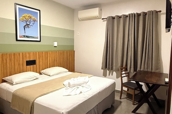 Deluxe Double Room | Minibar, desk, blackout drapes, iron/ironing board