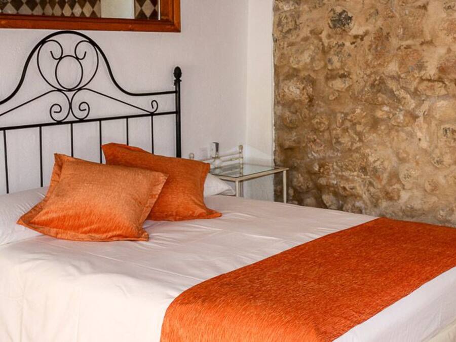 Ropa de cama de alta calidad y minibar