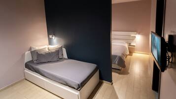 Dreibettzimmer | 1 Schlafzimmer, hochwertige Bettwaren, Schreibtisch