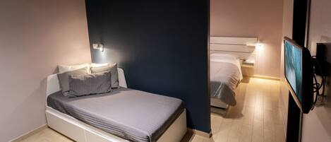 Chambre Triple | 1 chambre, literie de qualité supérieure, bureau, chambres insonorisées