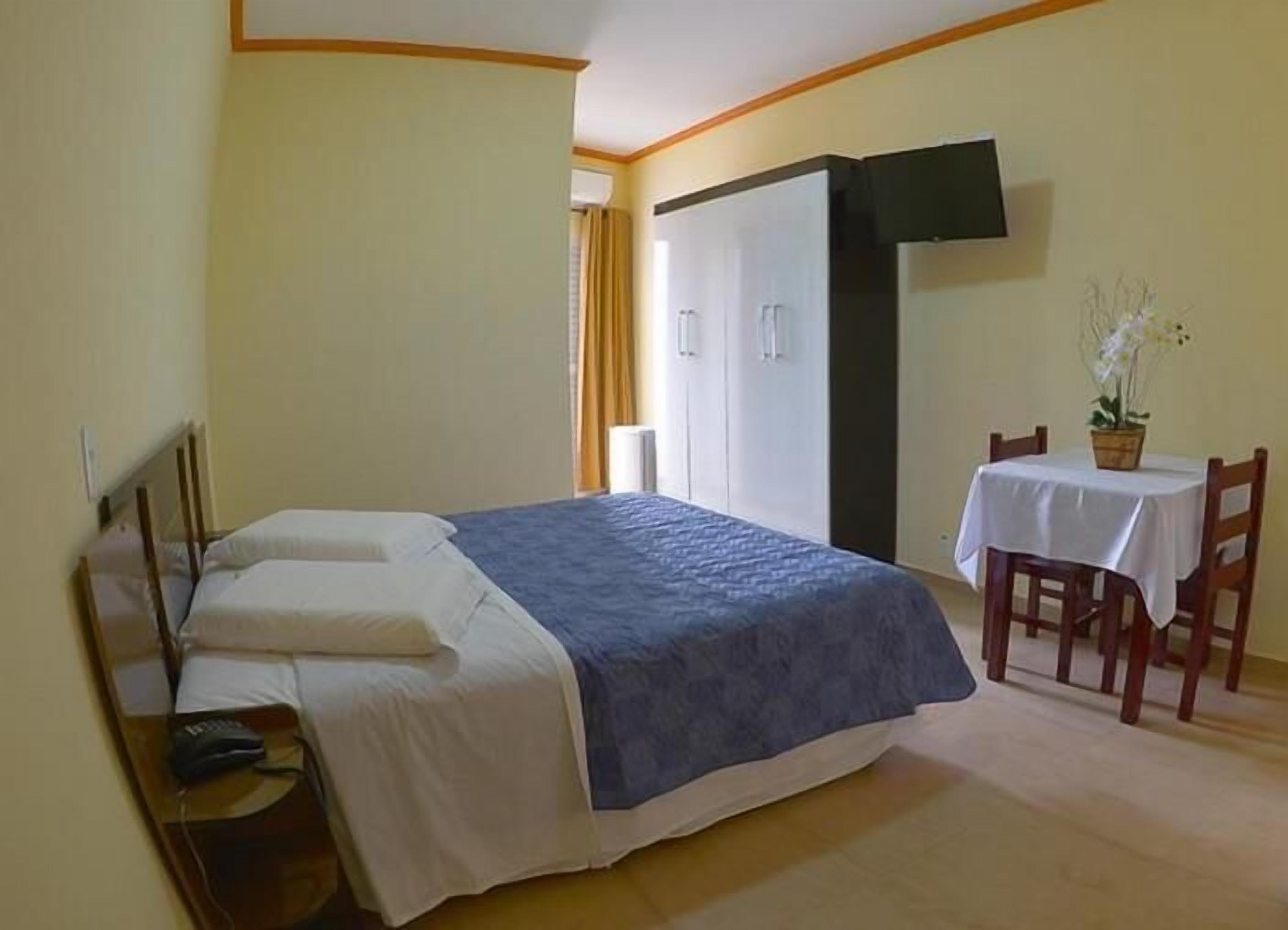 minibar, desk, laptop workspace, blackout curtains