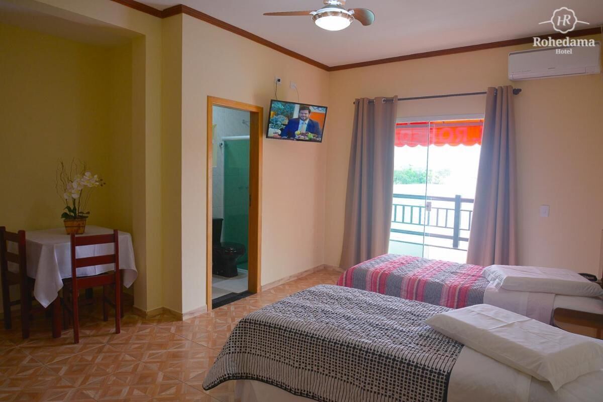 minibar, desk, laptop workspace, blackout curtains