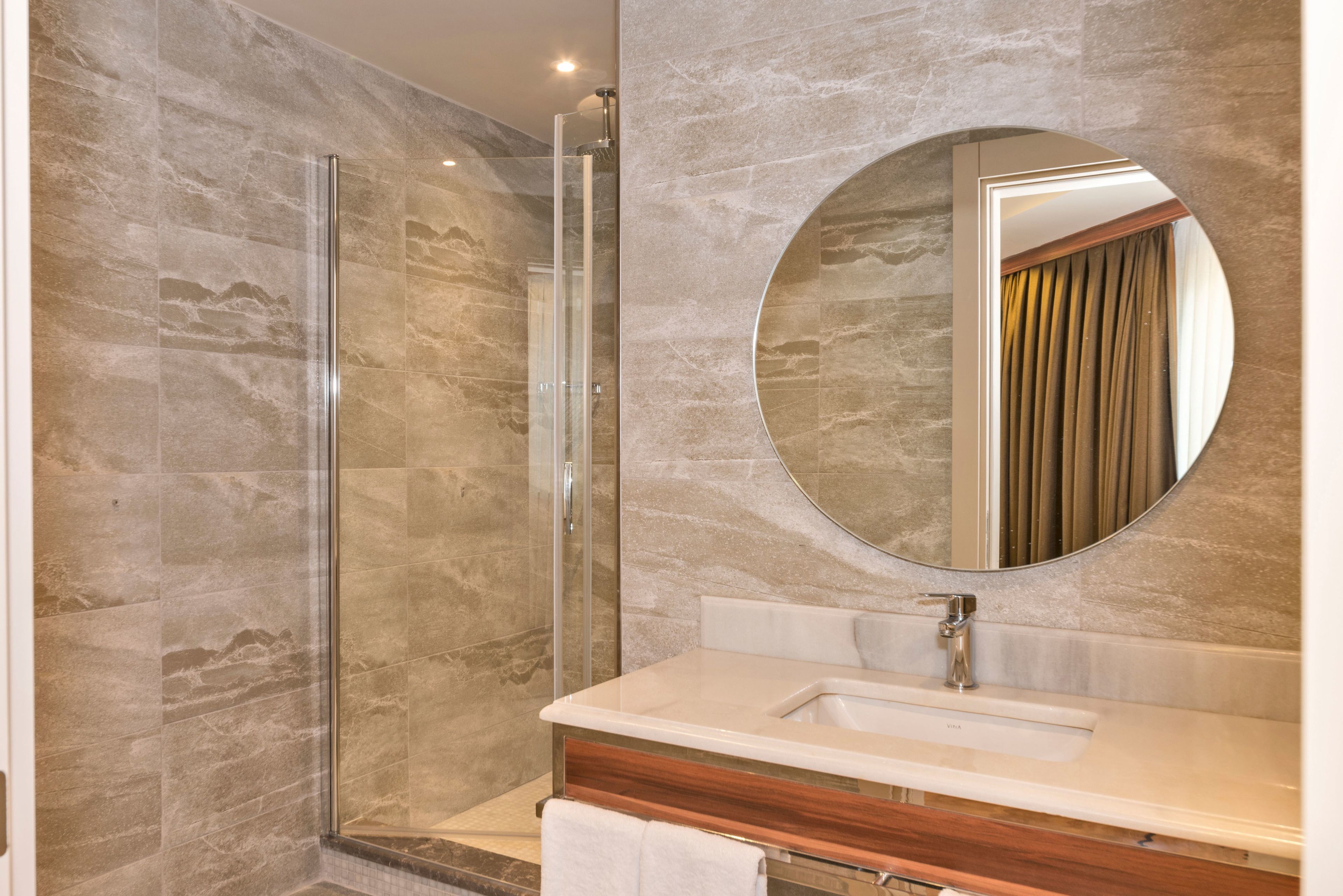 family suite room  | bathroom | shower, eco-friendly toiletries, hair dryer, slippers