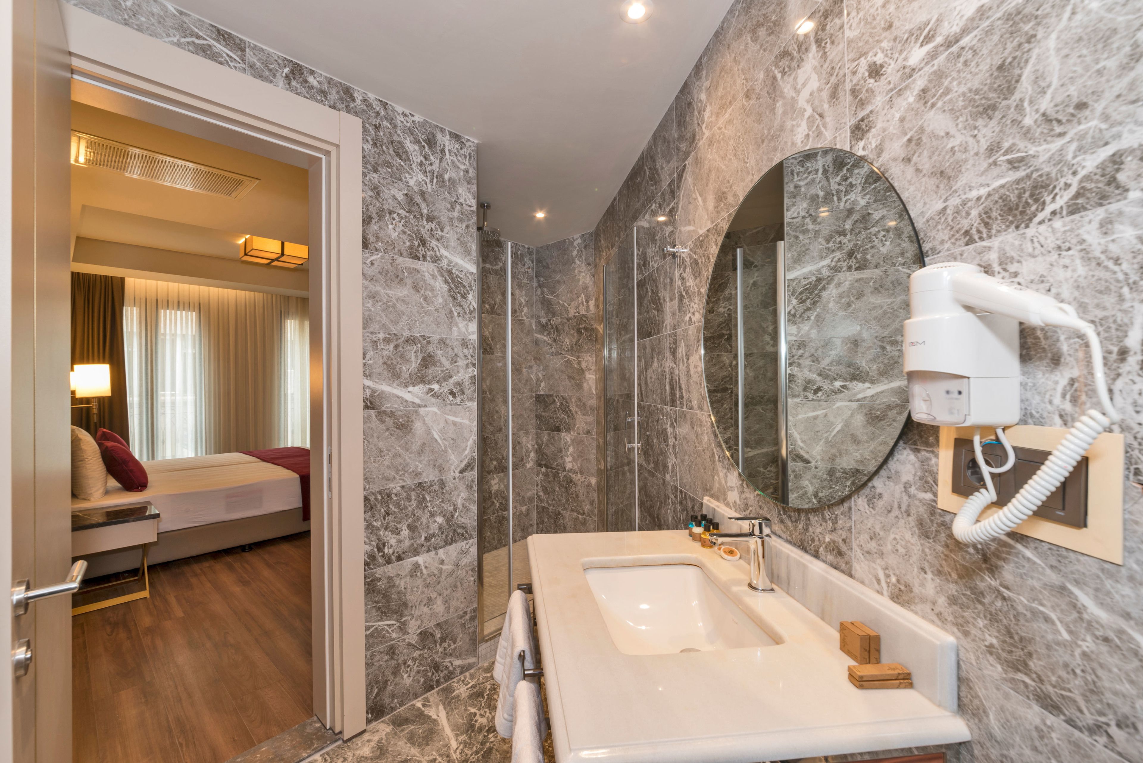 shower, eco-friendly toiletries, hair dryer, slippers