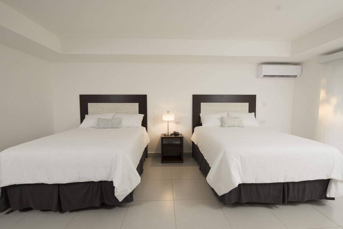 Deluxe Double Room (Two Double Beds) | In-room safe, desk, soundproofing, iron/ironing board