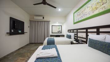 Habitación triple Confort | Ropa de cama de alta calidad y minibar