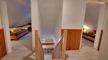 Comfort Chalet, 4 Bedrooms, Non Smoking, Garden View | 4 bedrooms, in-room safe, soundproofing, iron/ironing board