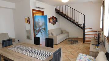 Comfort Duplex, 1 Bedroom | Living area | LED TV