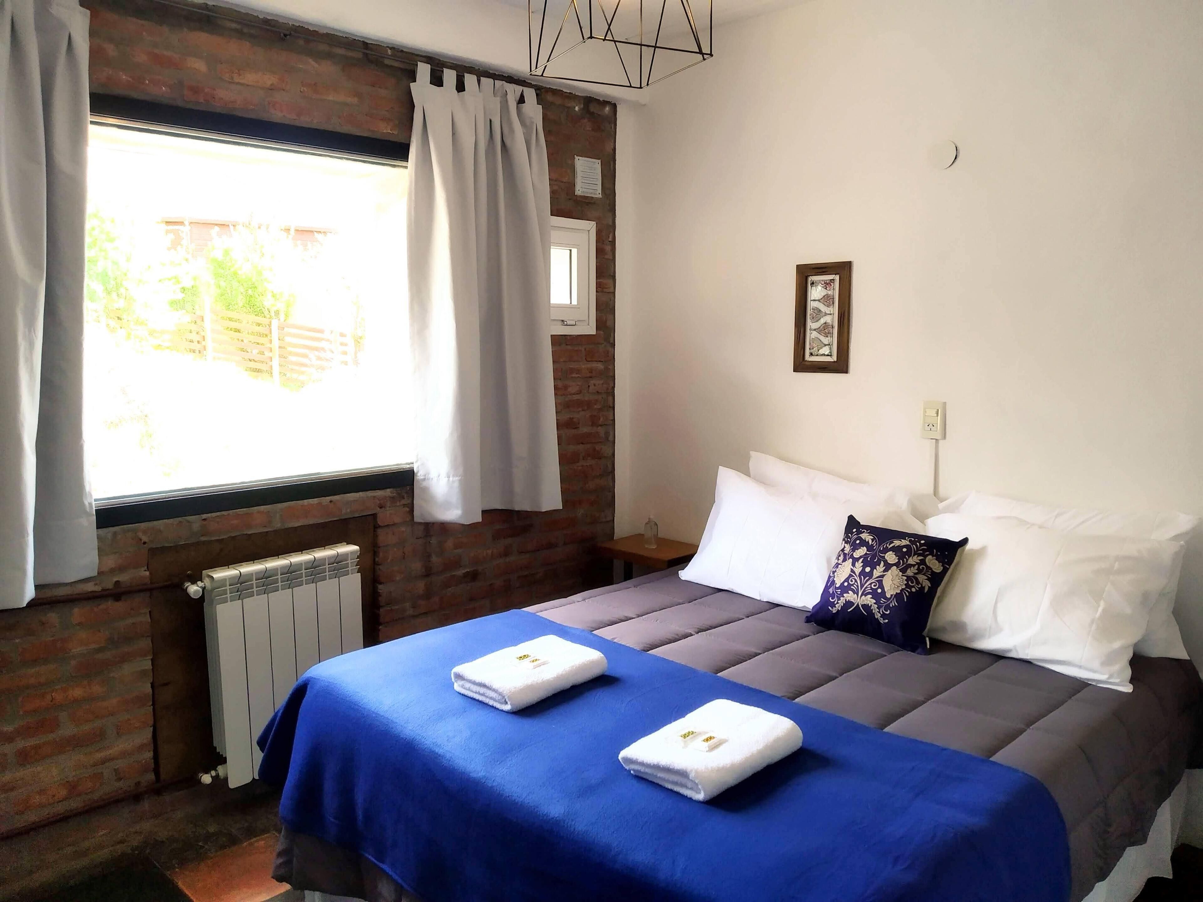 Habitación doble clásica | Ropa de cama de alta calidad, edredón y cortinas blackout 