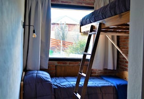 Premium bedding, down comforters, blackout drapes, soundproofing