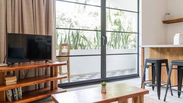 Classic Apartment, 1 Bedroom | Living area | Flat-screen TV