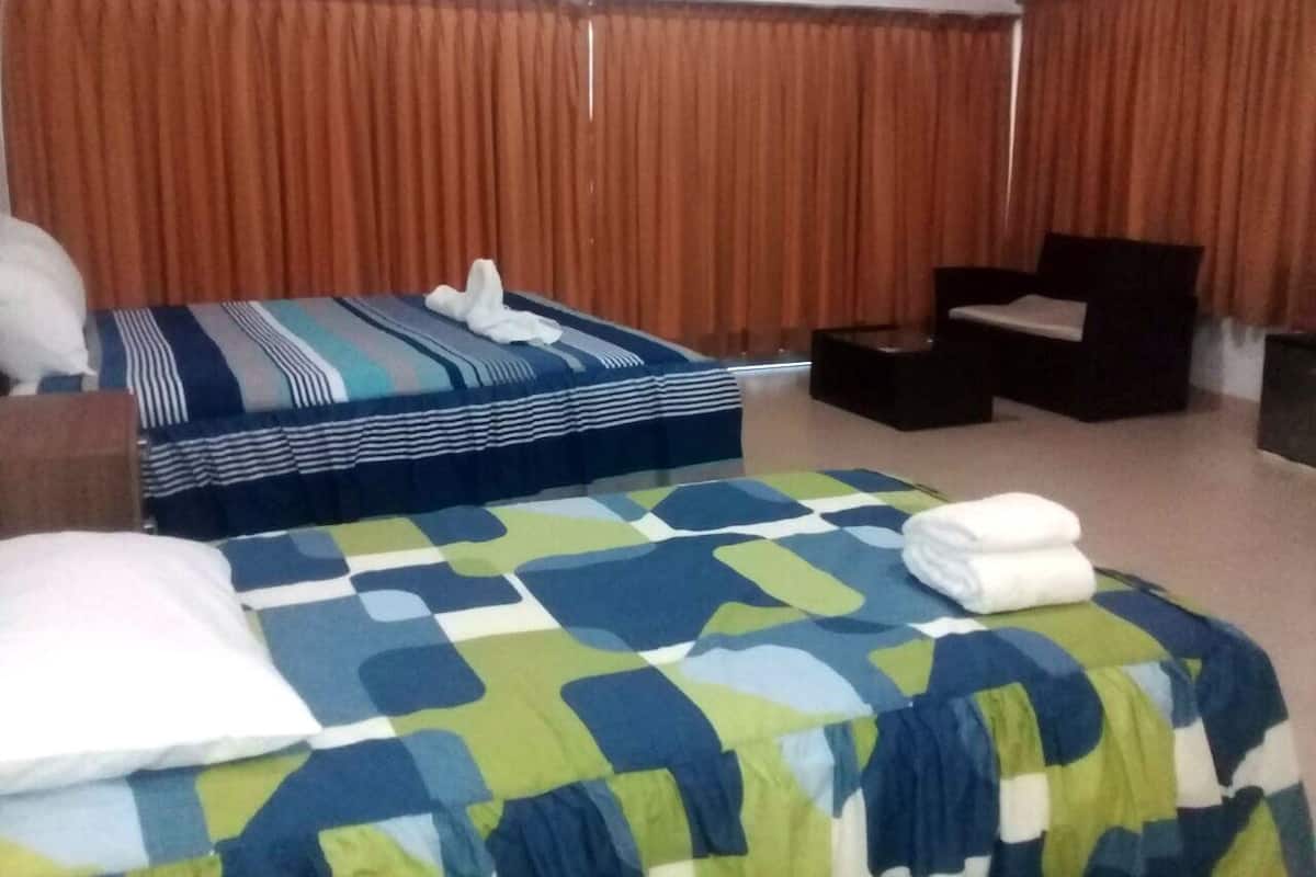 Habitación triple, vista al océano | Camas extra, wifi gratis y ropa de cama