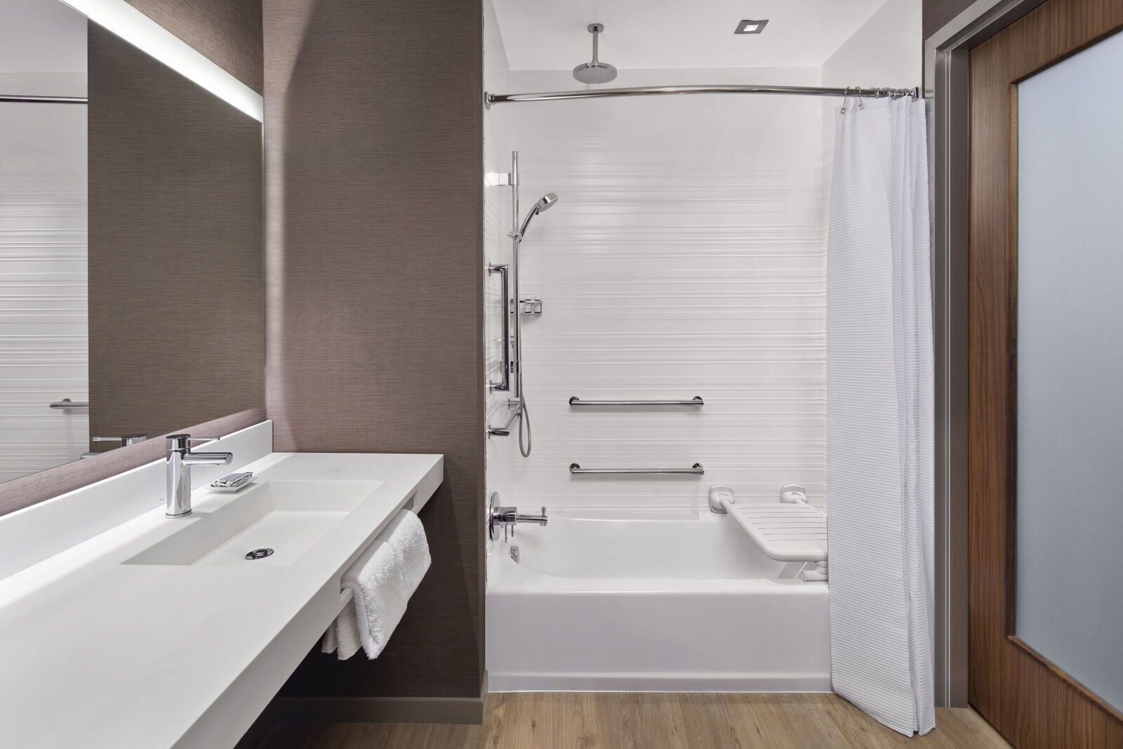 designer toiletries, hair dryer, towels