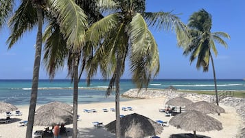 Private beach nearby, white sand, beach shuttle, beach cabanas