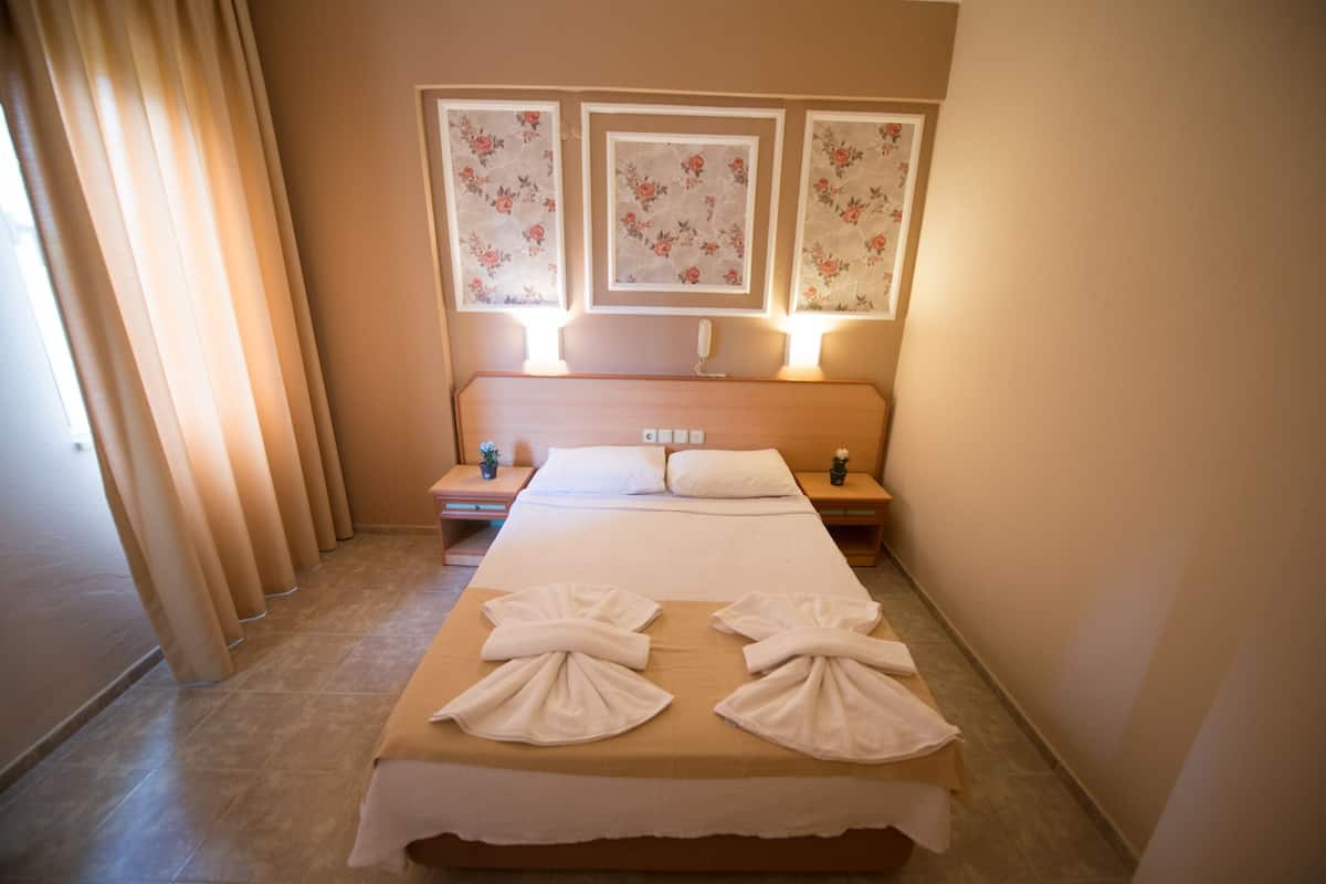1 habitación, ropa de cama de alta calidad, minibar y escritorio