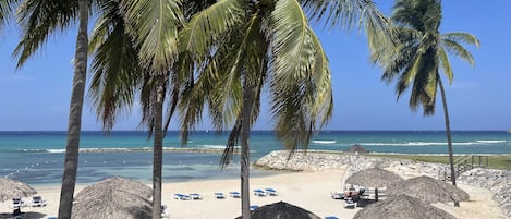 Private beach nearby, white sand, beach shuttle, beach cabanas