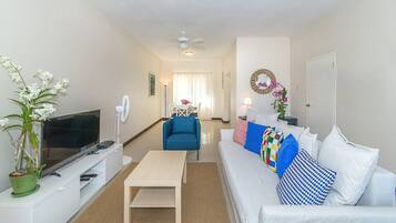 Deluxe Townhome, 2 Bedrooms, Sea View, Beachfront | Living room | 42-inch flat-screen TV with cable channels, TV