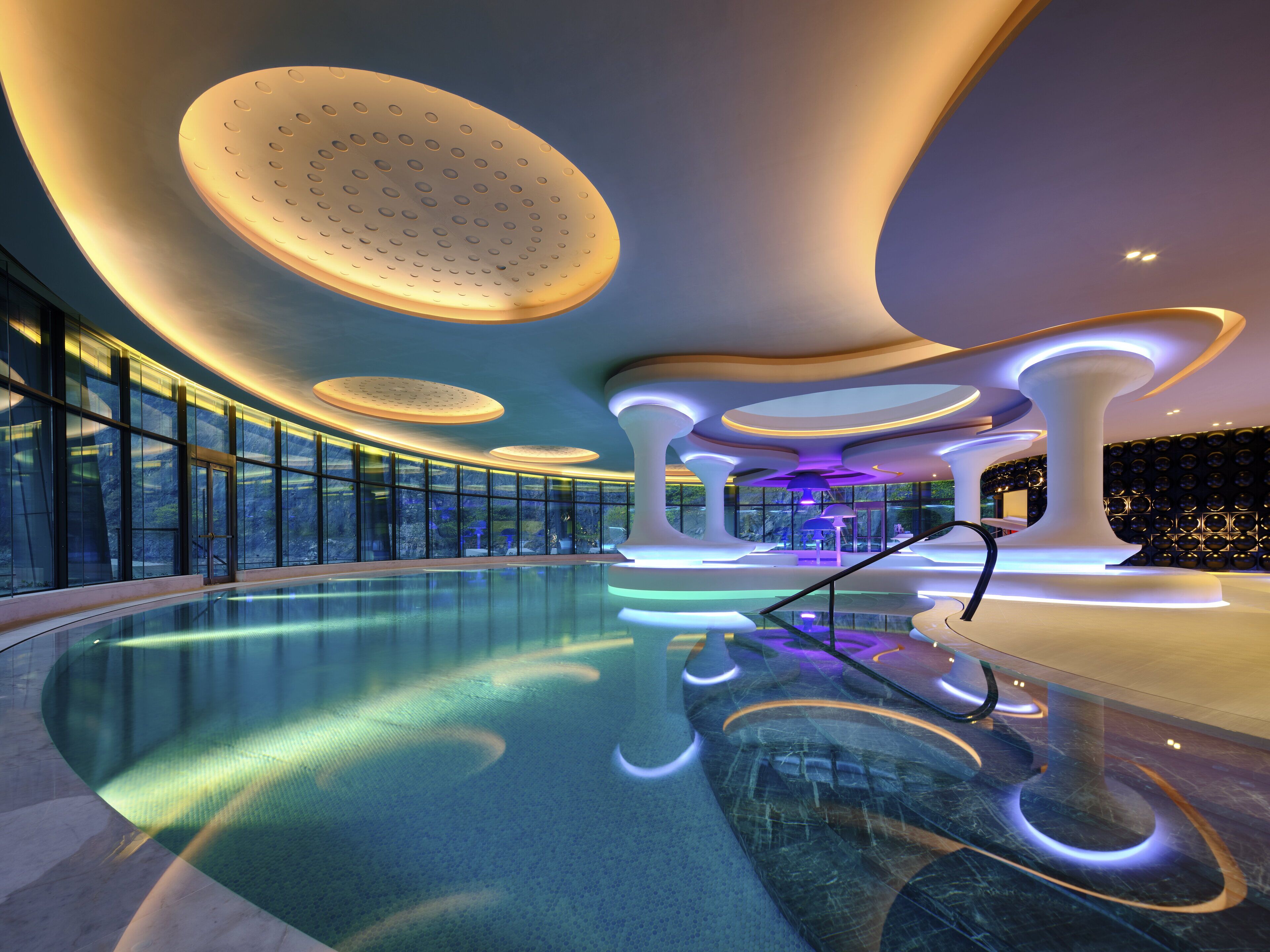 Indoor pool, open 7:00 AM to 10:00 PM, pool umbrellas, sun loungers