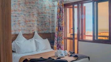 Habitación Confort | Ropa de cama de alta calidad y decoración individual