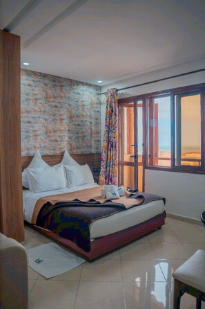 Chambre Confort | Literie de qualité, décor unique, ameublement unique