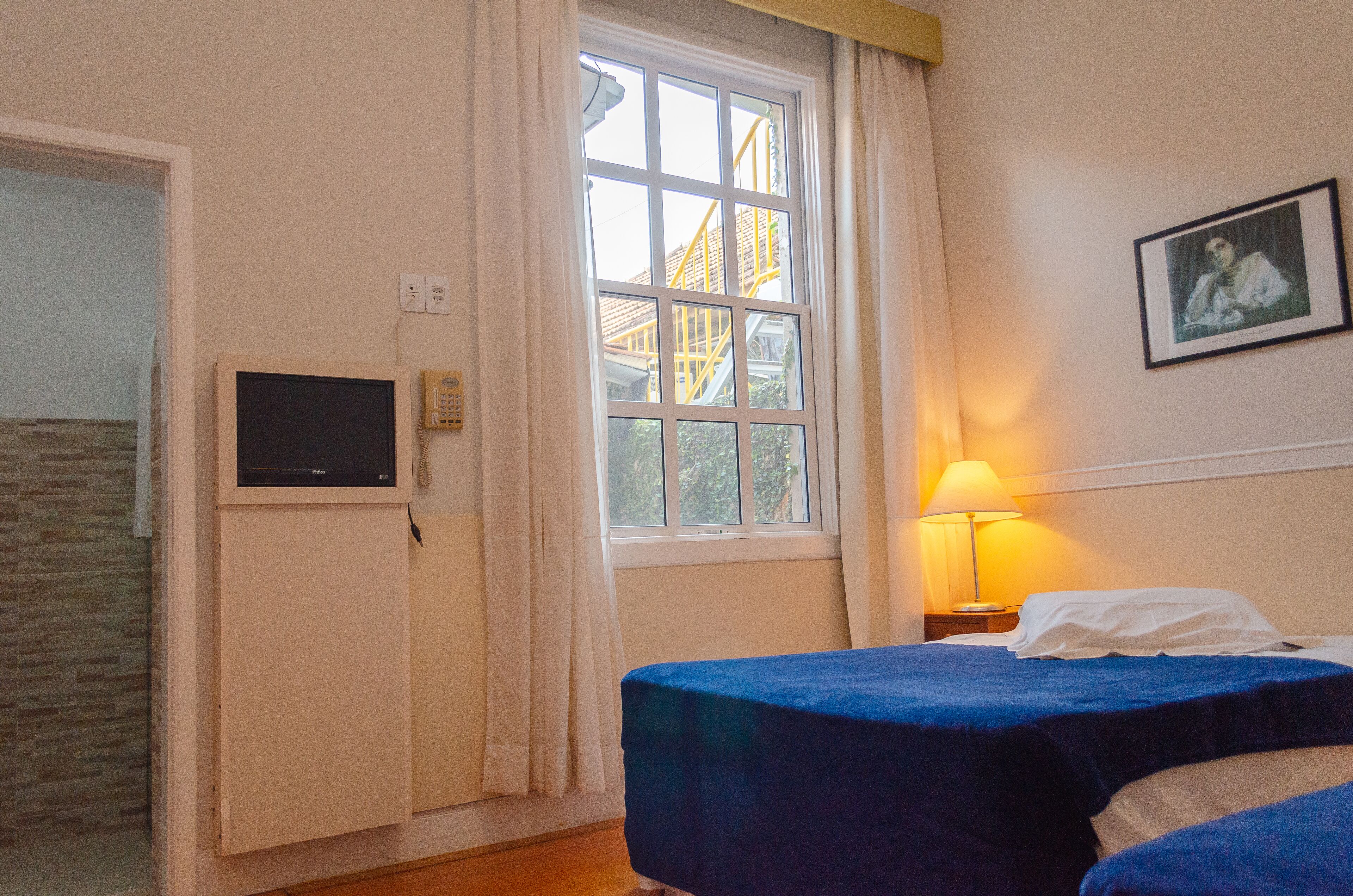 luxury quadruple room, 2 queen beds | 1 bedroom, minibar, desk, iron/ironing board