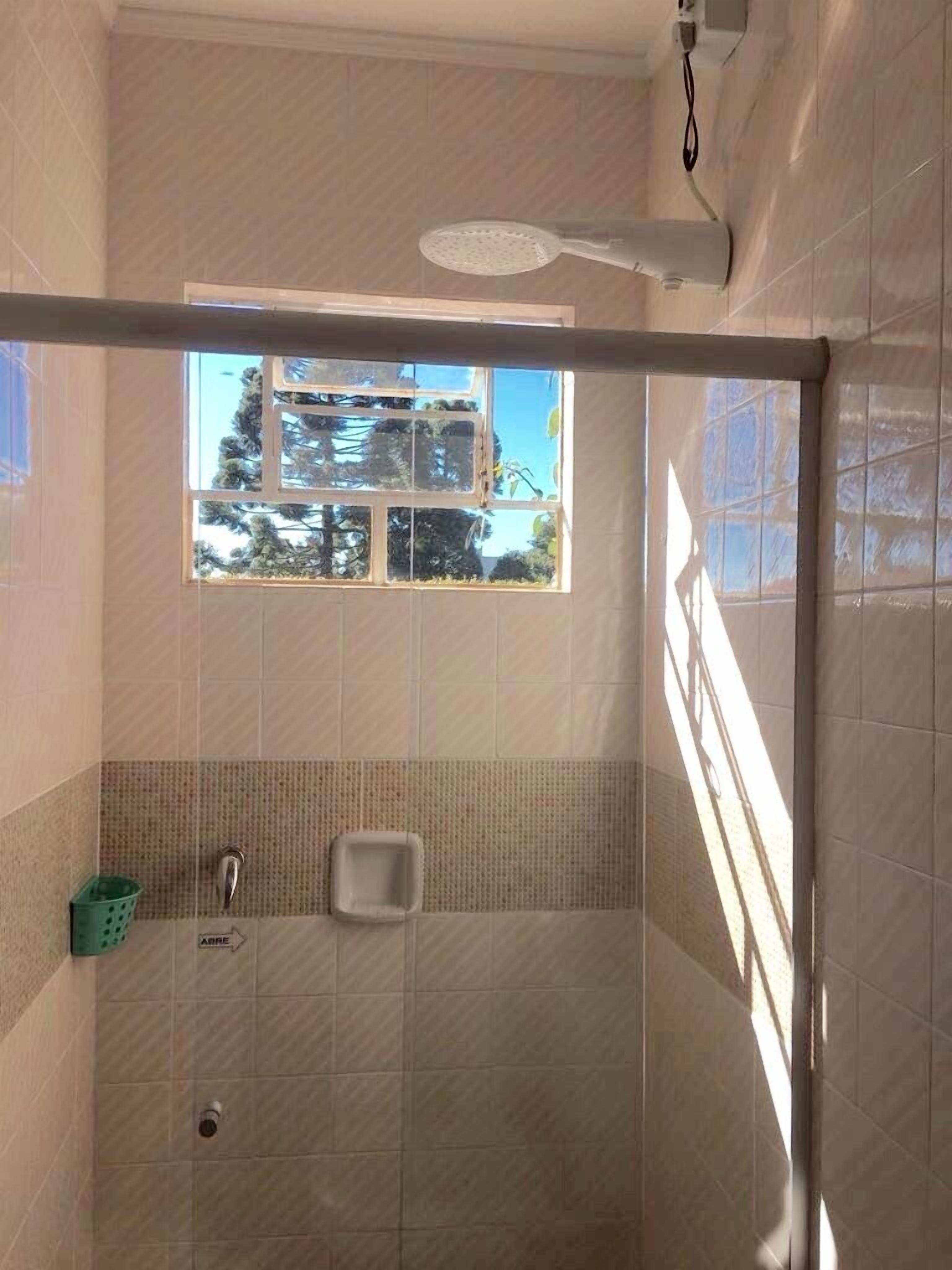 economy double room single use, 1 queen bed | bathroom shower