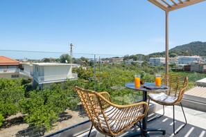 Family Suite, Multiple Bedrooms, 2 Bathrooms | Terrace/patio