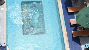 Outdoor pool, pool umbrellas, pool loungers