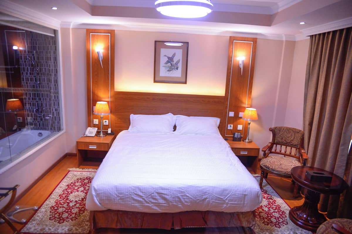 Suite Deluxe | 1 habitación, sábanas de algodón egipcio y ropa de cama de alta calidad