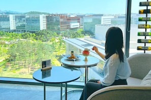 Breakfast, lunch served; local and international cuisine, garden views