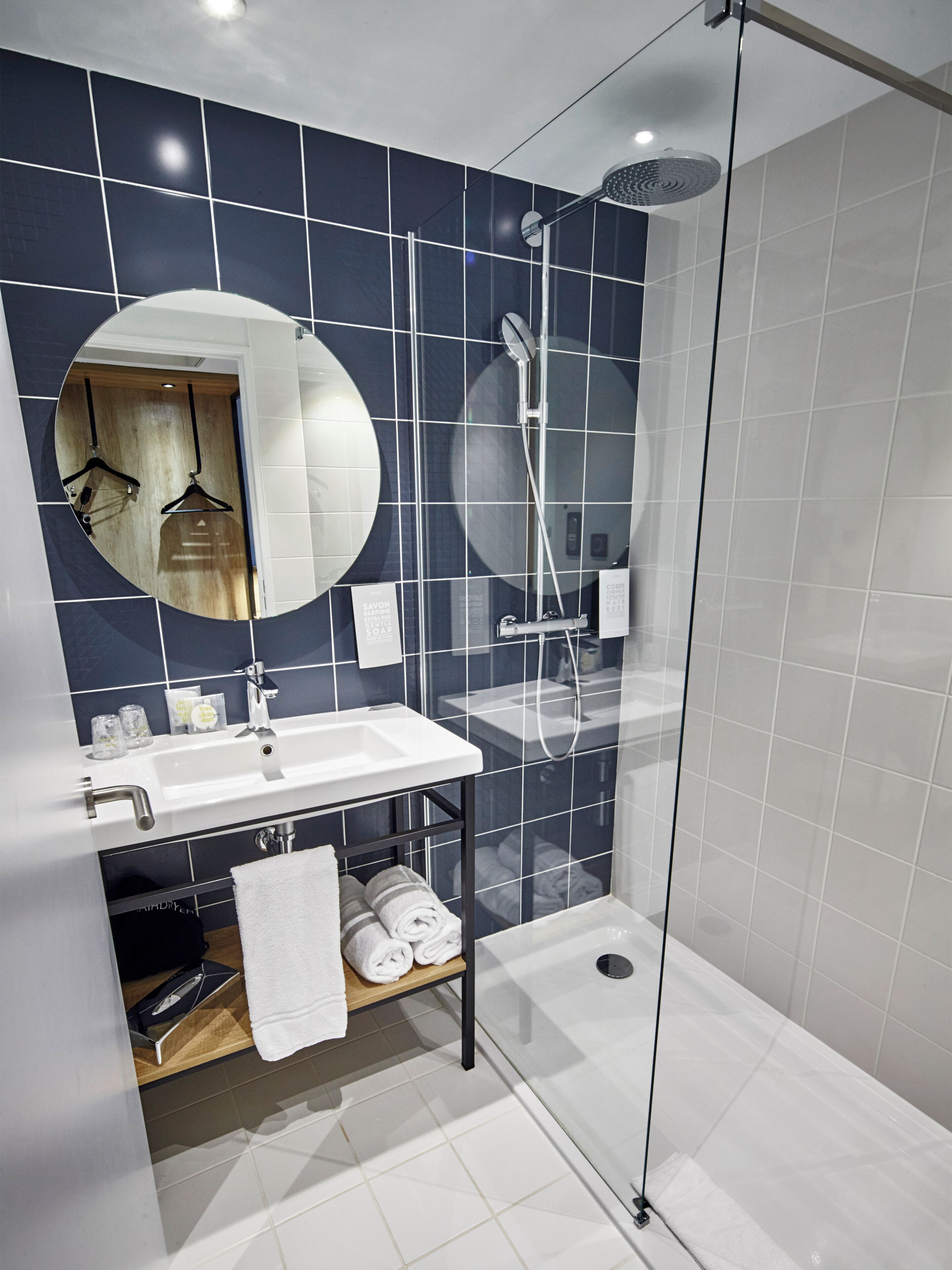 rainfall showerhead, eco-friendly toiletries, hair dryer, slippers