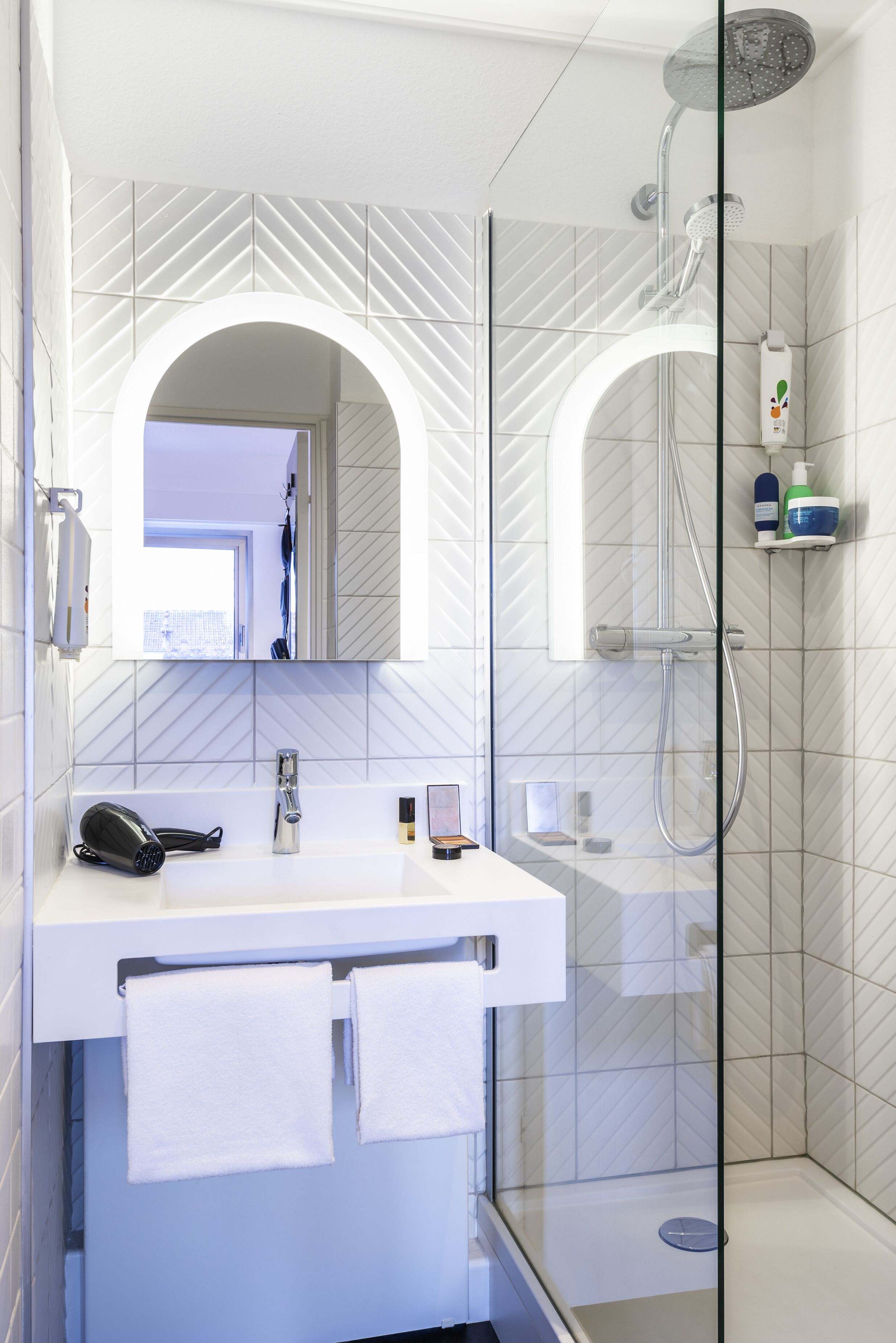 eco-friendly toiletries, hair dryer, towels