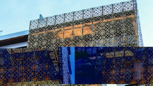 A building with a distinctive geometric facade featuring intricate lattice patterns. - IT Boutique Hotel & Restaurant (Playa del Carmen)
