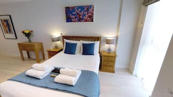 Apartment, 2 Double Beds, City View | Iron/ironing board, free WiFi, bed sheets