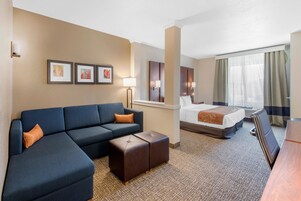 Premium bedding, desk, laptop workspace, blackout curtains