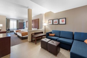 Premium bedding, desk, laptop workspace, blackout curtains