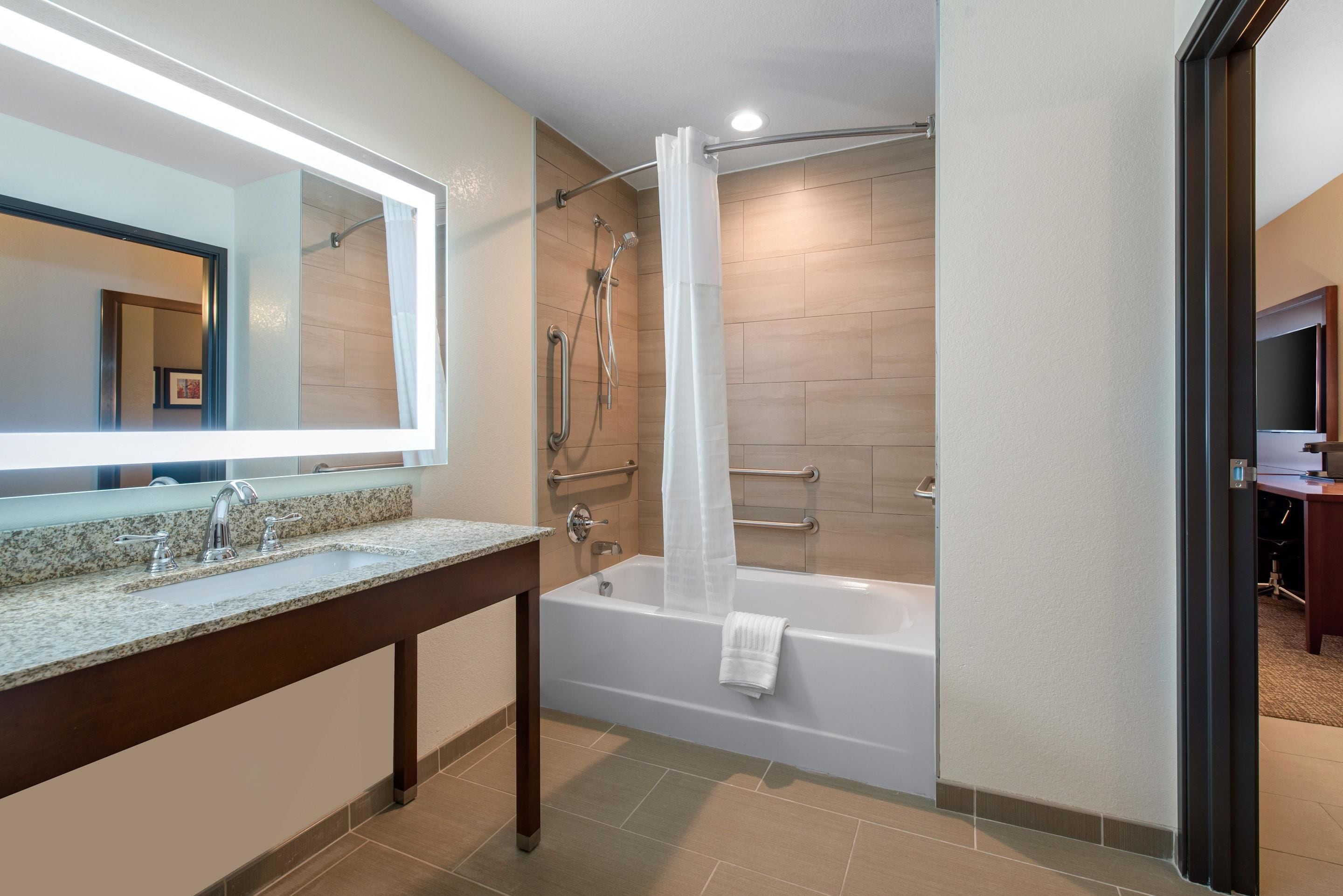 premium bedding, desk, laptop workspace, blackout curtains