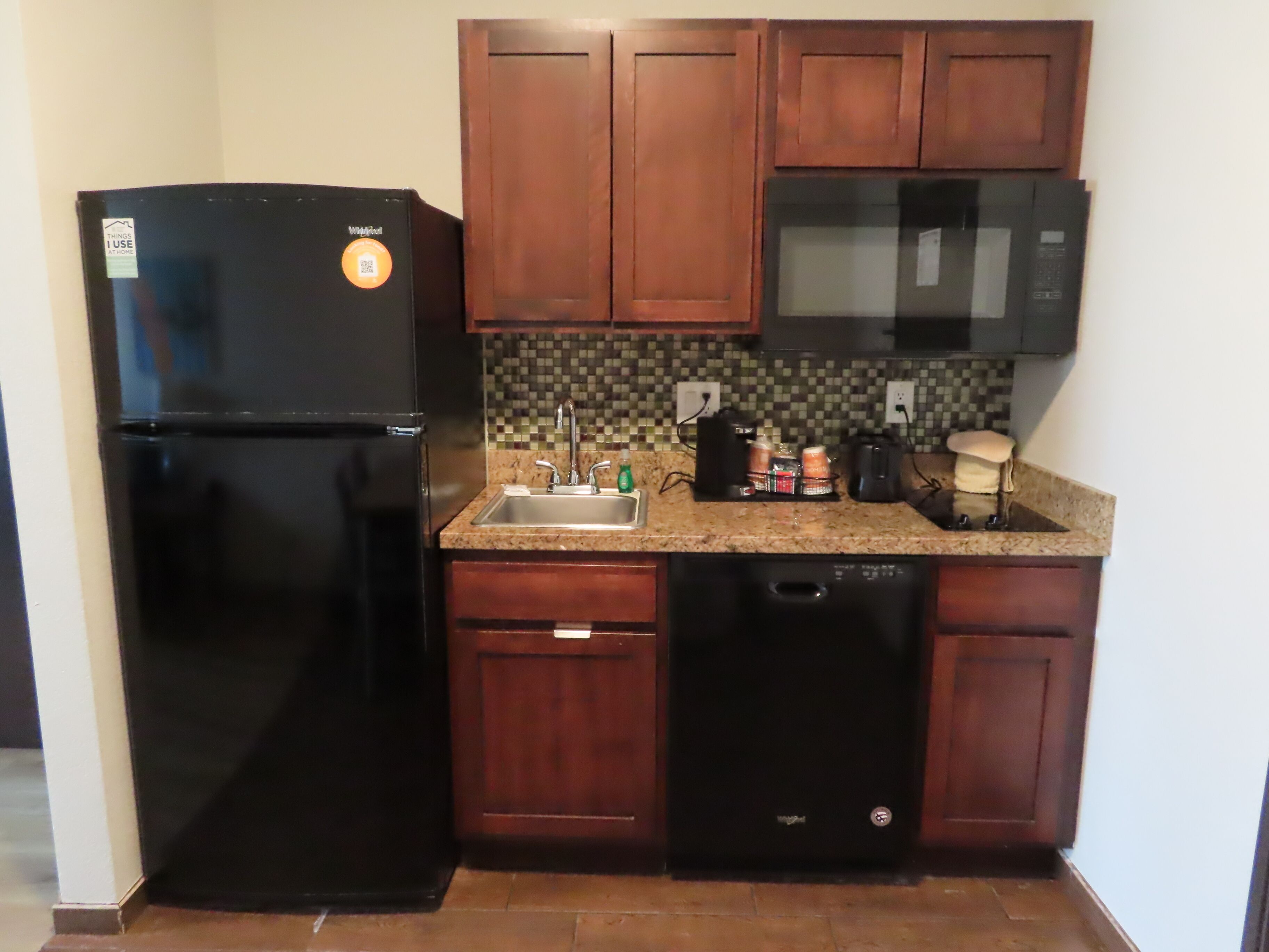 suite, 1 king bed with sofa bed, non smoking | private kitchen | coffee/tea maker