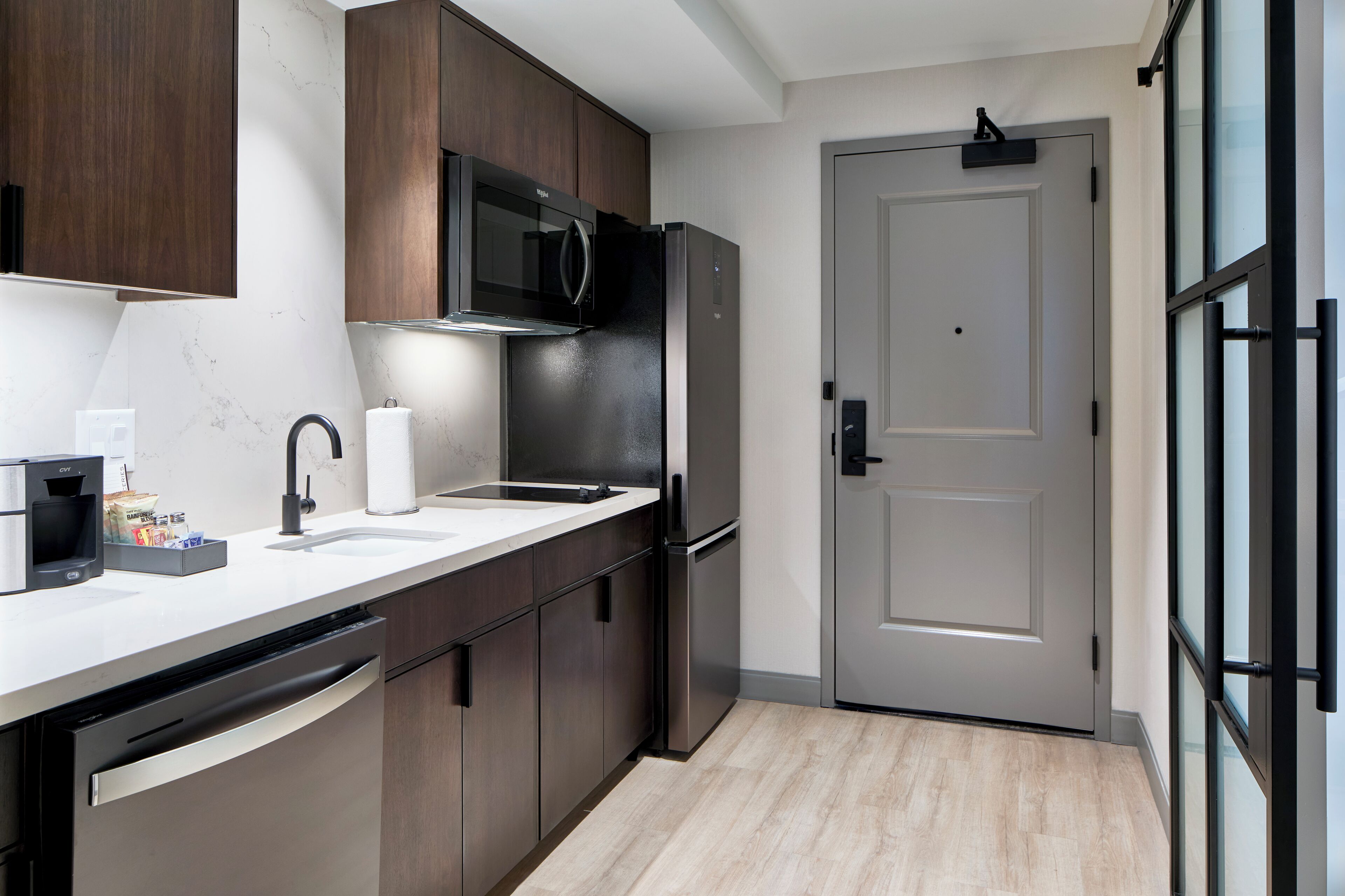 full-sized fridge, microwave, stovetop, dishwasher