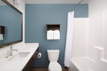 Desk, blackout drapes, iron/ironing board, free WiFi at WoodSpring Suites San Antonio Stone Oak