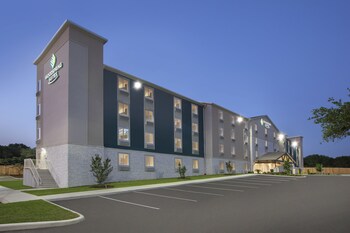 Front of property - evening/night at WoodSpring Suites San Antonio Stone Oak