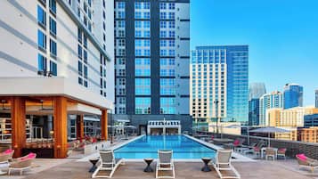 Outdoor pool, open 6:00 AM to 10:00 PM, pool cabanas (surcharge)