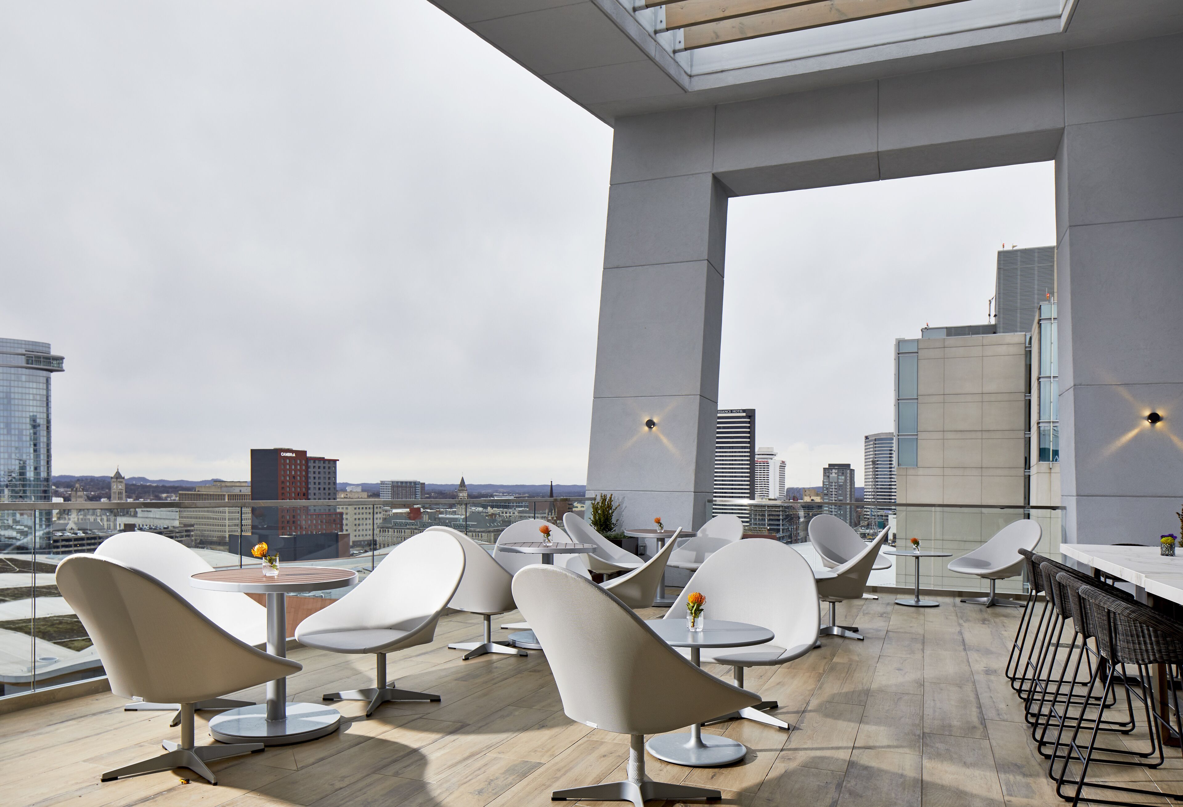 3 bars/lounges, rooftop bar, lobby lounge